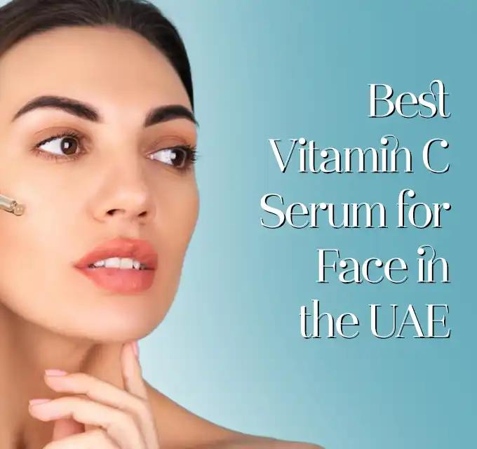 Smiling woman dispensing vitamin C serum from a dropper into her palm showcases best vitamin C serum for face with antioxidant benefits for brighter, smoother skin